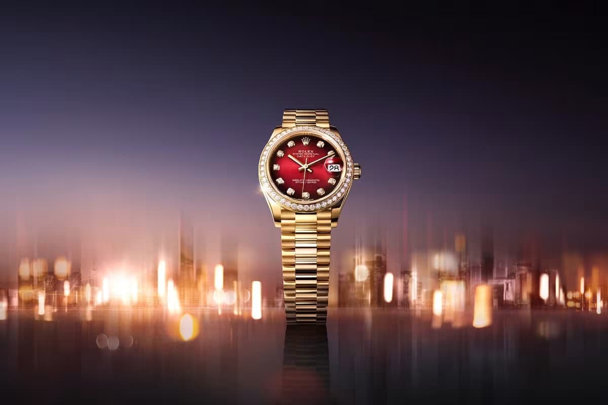 Rolex Datejust in yellow gold, striking red ombré dial with diamonds